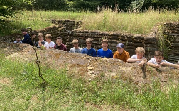 students in a trench