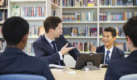 student and teacher in class